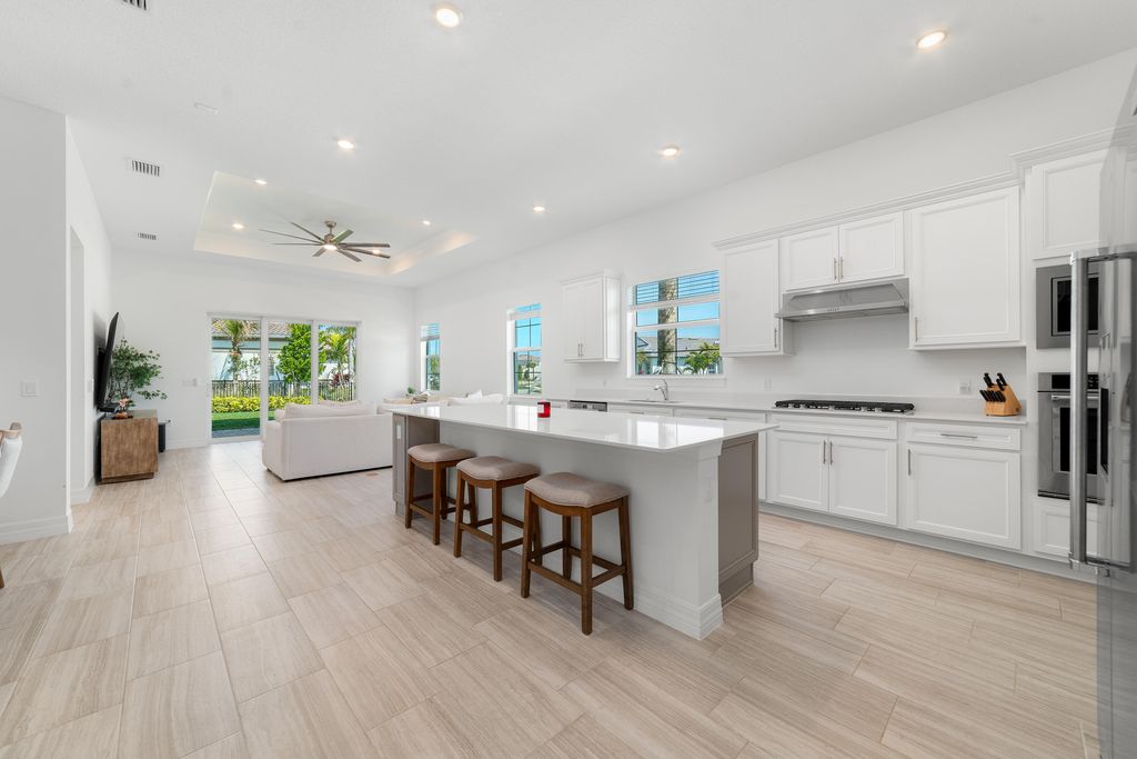 Photo of 12305 Frontline Lane, Palm Beach Gardens, FL 33412 (MLS # B26007588)