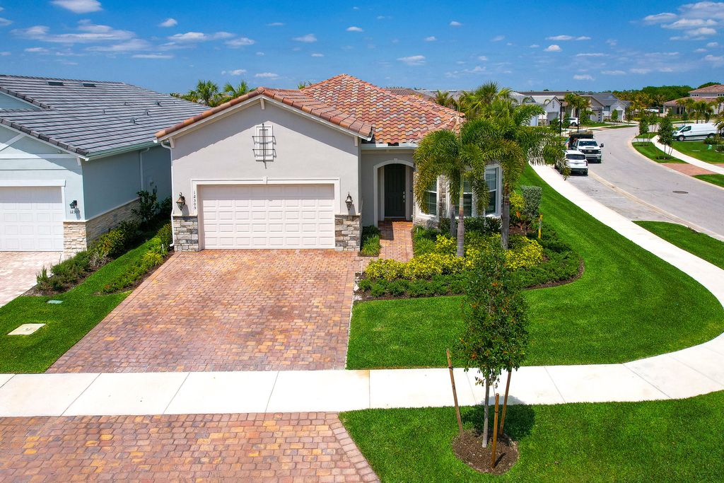 Photo of 12305 Frontline Lane, Palm Beach Gardens, FL 33412 (MLS # B26007588)