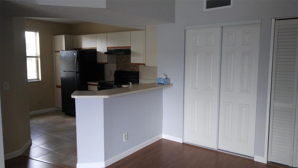 Photo of 8821 Wiles Road #207, Coral Springs, FL 33067 (MLS # F10508581)