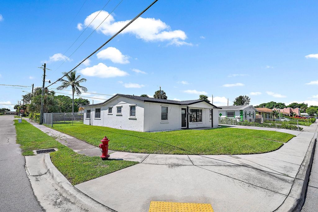 Photo of 1301 W 26th Street, Riviera Beach, FL 33404 (MLS # R11129737)
