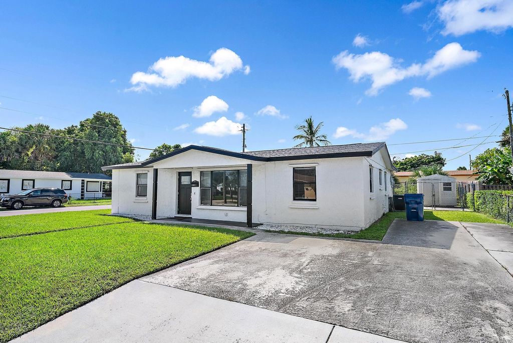 Photo of 1301 W 26th Street, Riviera Beach, FL 33404 (MLS # R11129737)