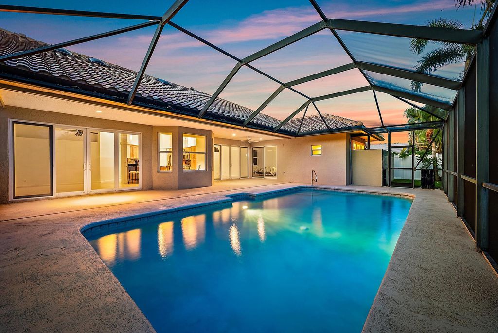 Photo of 9231 Cypress Hollow Drive, Palm Beach Gardens, FL 33418 (MLS # R11117508)