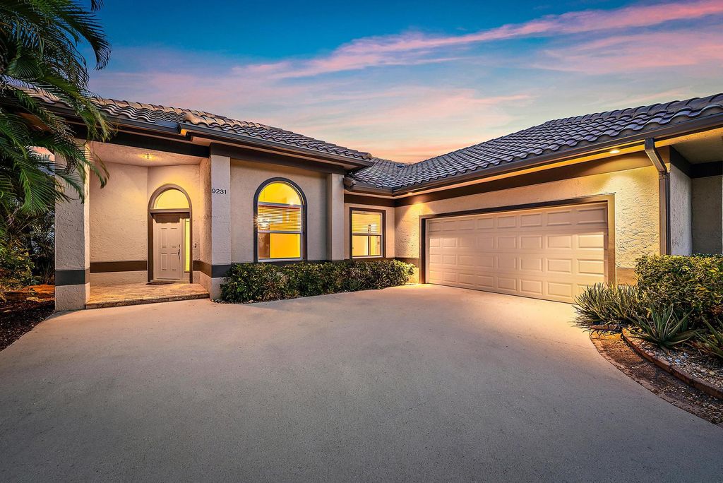 Photo of 9231 Cypress Hollow Drive, Palm Beach Gardens, FL 33418 (MLS # R11117508)