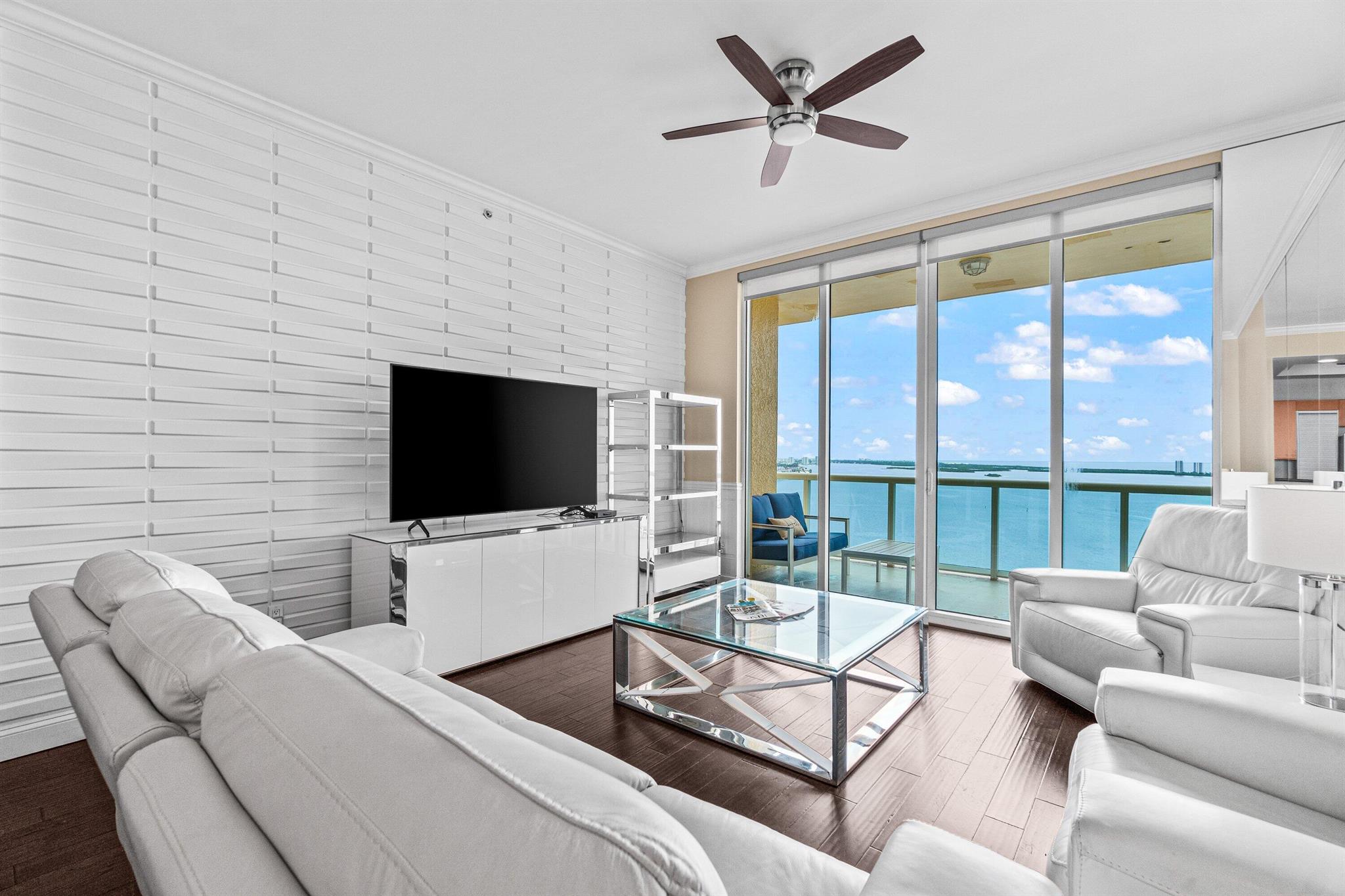 PENTHOUSE OVERLOOKING THE INTRACOASTAL! Beautifully furnished 3BR / 3BA annual rental, panoramic 24th floor ICW & ocean views! Open concept, split floor plan w/ wood floors in living areas, crown molding. Granite kitchen has skylight for added natural light. Spacious owners suite w/his & her walk-in closets. Primary bath w/double vanity, jetted bath & water closet. Assigned garage parking. 24/7 manned gate, valet, NEW covered rooftop oasis w/pool, spa, BBQ areas, tennis, pickleball, bocce. Clubhouse, fitness center & billiard room. Adjacent dry dock marina, no fixed bridges, minutes to ocean. Waterfront walking path w/gazebo, pet friendly. Minutes to nationally ranked snorkeling/diving at Blue Heron Bridge.