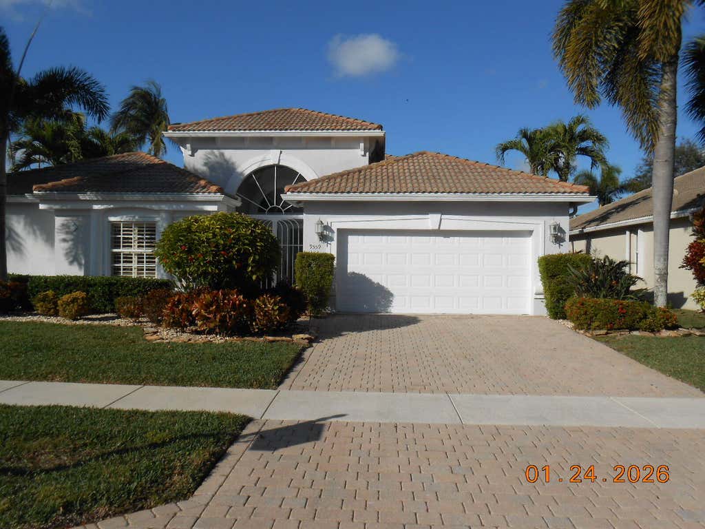 Photo of 9559 Taormina Street, Lake Worth, FL 33467 (MLS # R11157750)