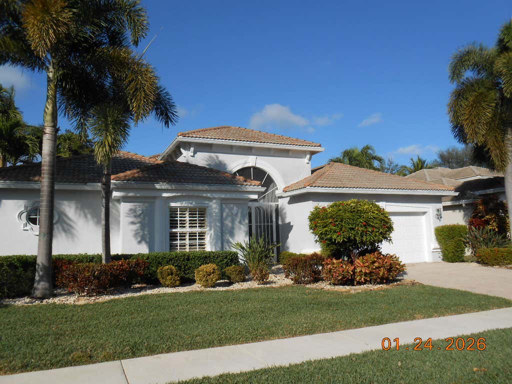 Photo of 9559 Taormina Street, Lake Worth, FL 33467 (MLS # R11157750)