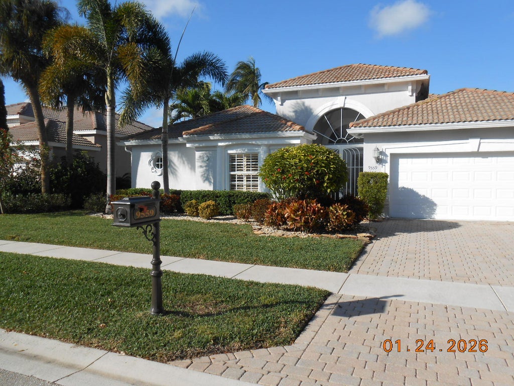 Photo of 9559 Taormina Street, Lake Worth, FL 33467 (MLS # R11157750)