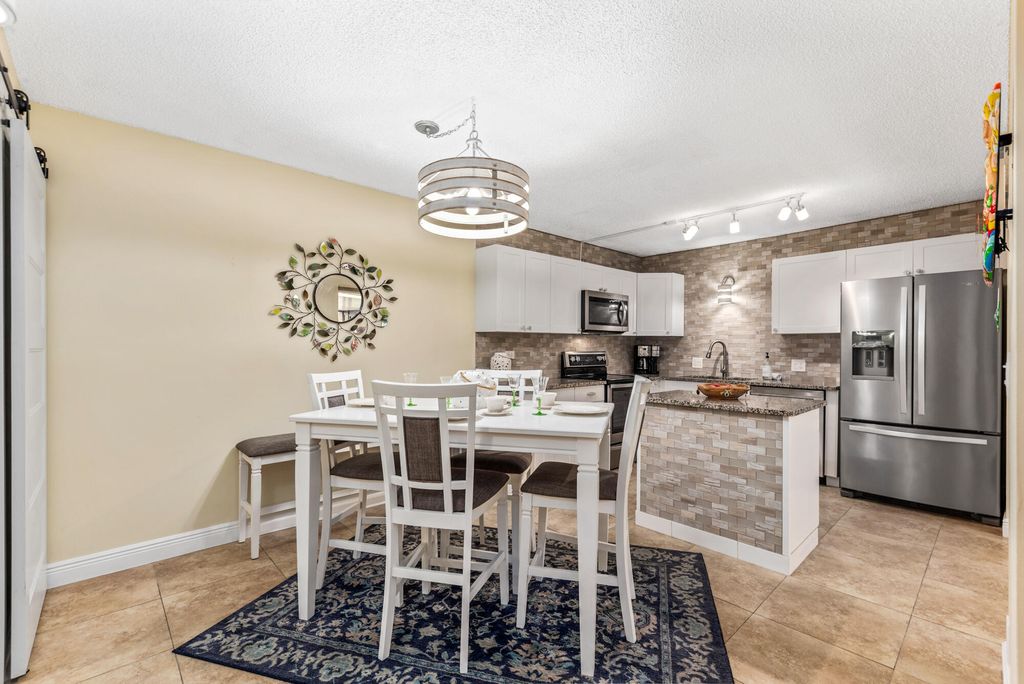 Photo of 5684 SE Riverboat Drive #135, Stuart, FL 34997 (MLS # R10803001)