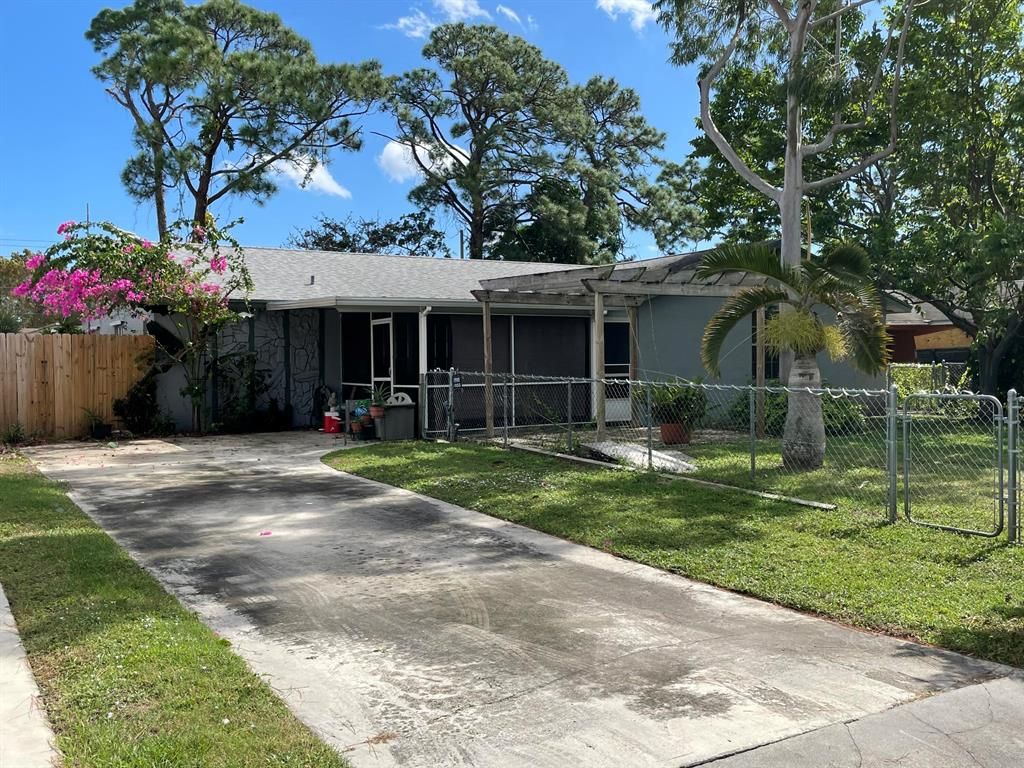 Photo of 2372 Pinewood Lane, West Palm Beach, FL 33415 (MLS # R10780785)