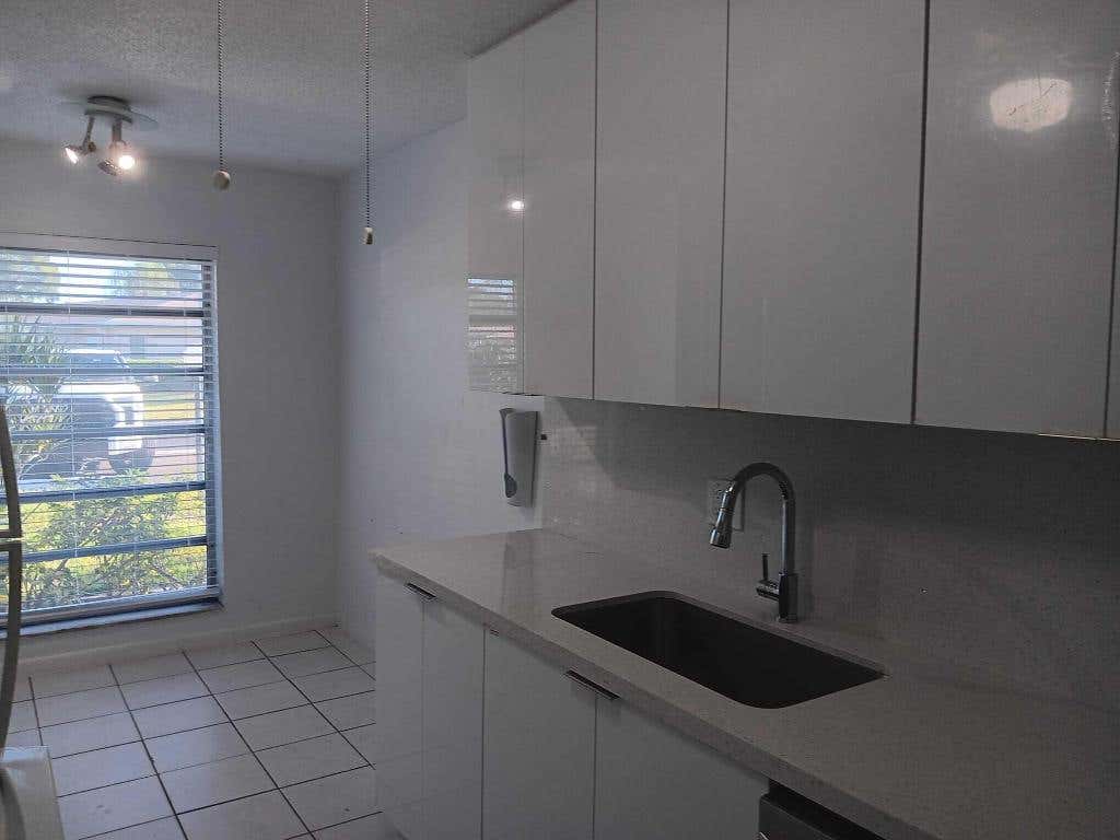 Photo of 20886 Vinesta Circle #313, Boca Raton, FL 33433 (MLS # R11145632)