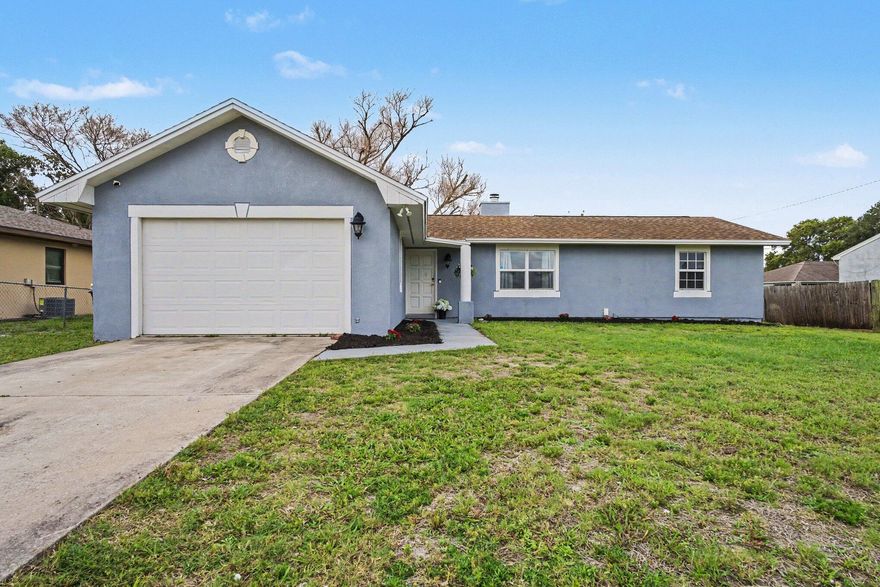 Whether you're a first-time homebuyer or looking to downsize, this home checks all the boxes! Featuring 3 bedrooms, 2 bathrooms, and a spacious 2-car garage, it offers both comfort and convenience. Enjoy outdoor living with a large fenced backyard and a screened-in lanai—perfect for relaxing or entertaining. Roof installed 2019 Priced to sell, this opportunity won't last long!