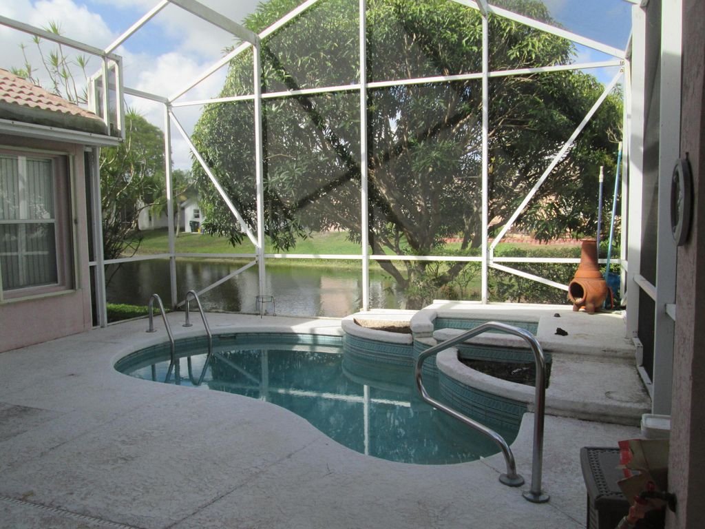 Photo of 2866 Waters Edge Circle, Greenacres, FL 33413 (MLS # R11168972)
