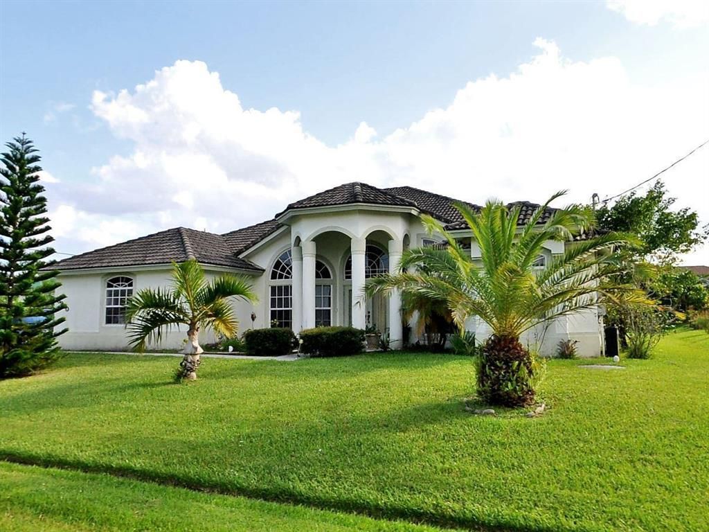 Photo of 5930 NW Baynard Drive, Port Saint Lucie, FL 34986 (MLS # R10706287)