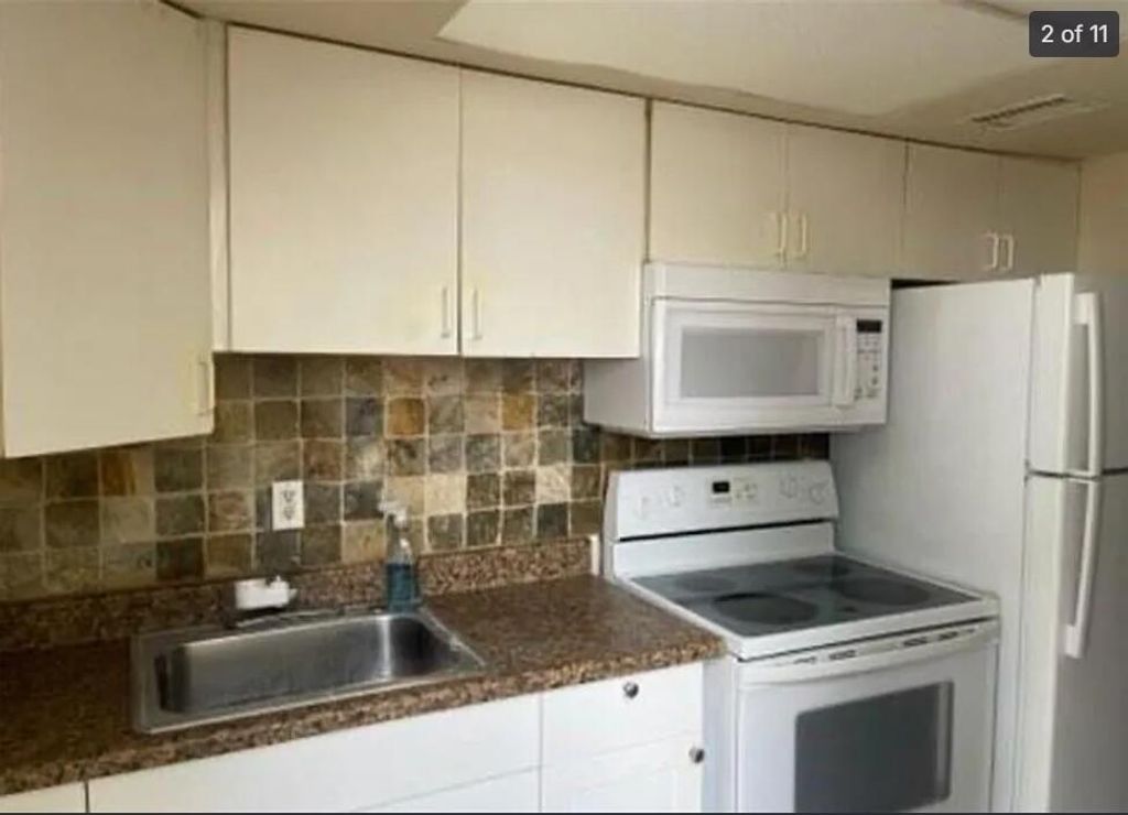 Photo of 1550 NW 15th Street #14, Boca Raton, FL 33486 (MLS # B26023743)