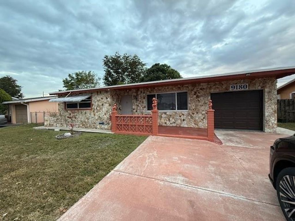 Photo of 9180 NW 25th Court, Sunrise, FL 33322 (MLS # F10551816)