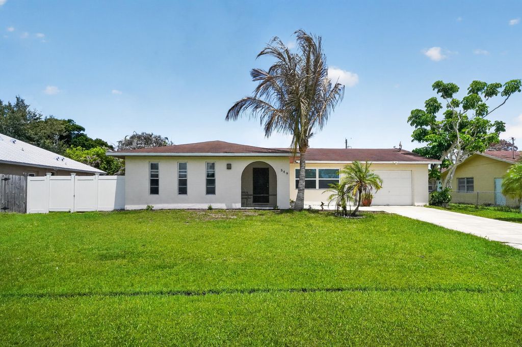 Photo of 549 SE Marydale Terrace, Port Saint Lucie, FL 34983 (MLS # B26032172)