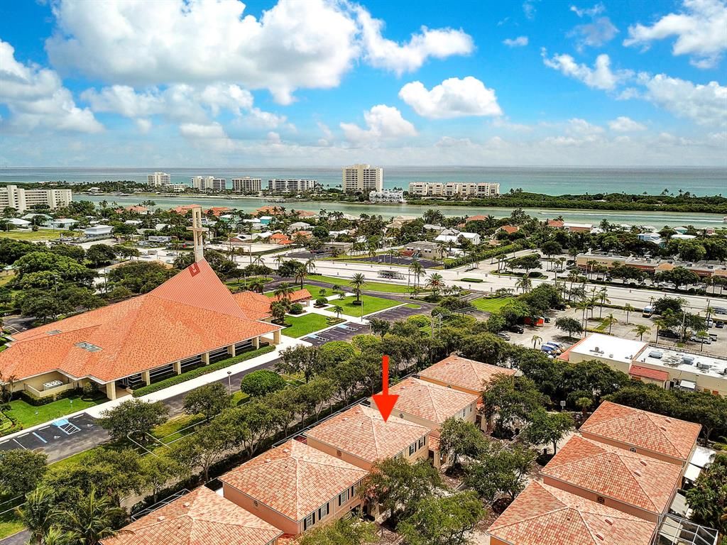 Photo of 63 Tall Oaks Circle, Tequesta, FL 33469 (MLS # R10748526)