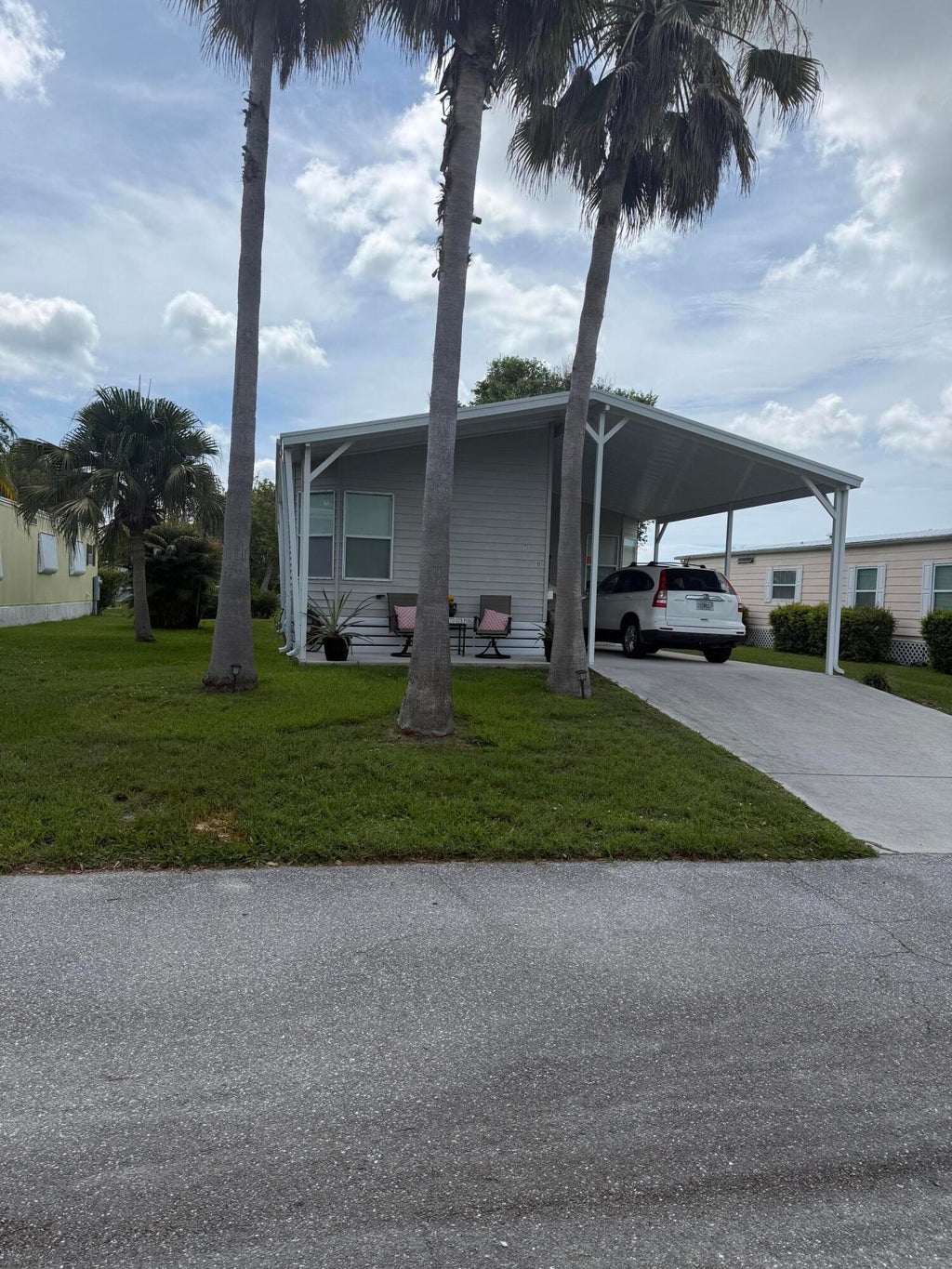 Photo of 11 Nuevo Leon Road, Port Saint Lucie, FL 34952 (MLS # B26049669)