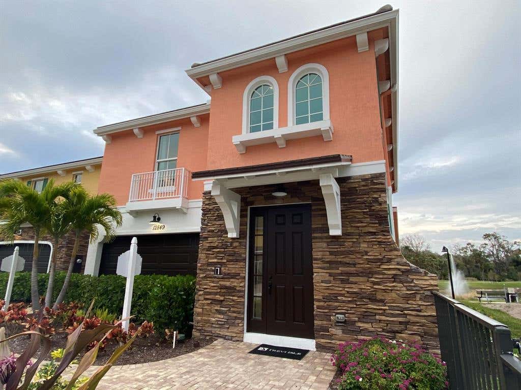 Photo of 12930 Trevi Isle Drive #50, Palm Beach Gardens, FL 33418 (MLS # R10688421)