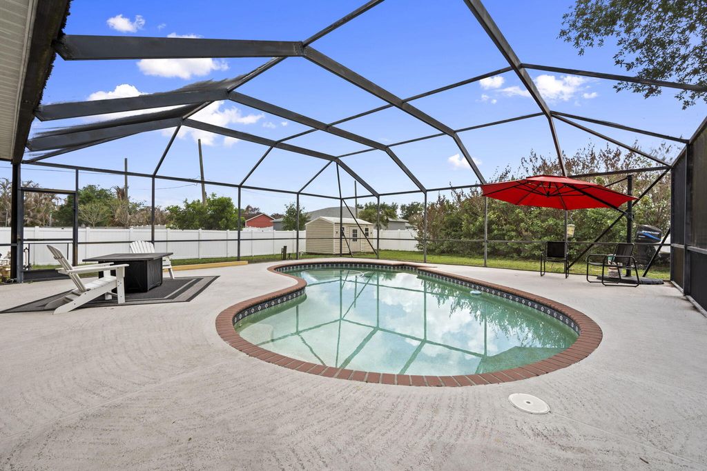 Photo of 138 SW Airview Avenue, Port Saint Lucie, FL 34984 (MLS # B26016113)