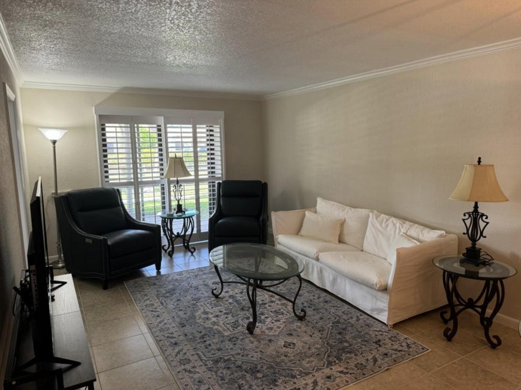 Photo of 330 SE 19th Avenue #E, Deerfield Beach, FL 33441 (MLS # R11125790)