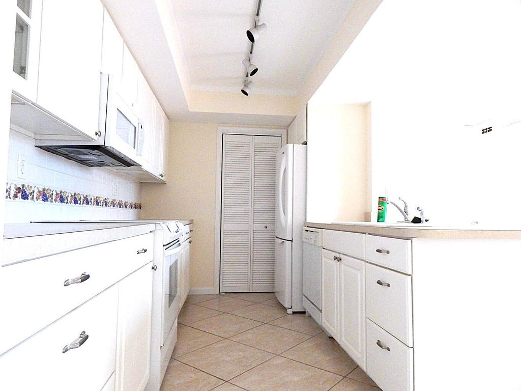 Photo of 5250 Woodland Lakes Drive #231, Palm Beach Gardens, FL 33418 (MLS # R11095844)