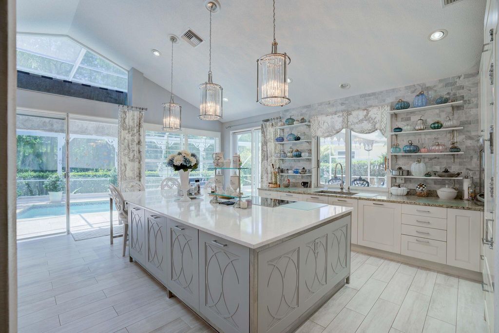 Photo of 16 Cayman Place, Palm Beach Gardens, FL 33418 (MLS # R10997752)