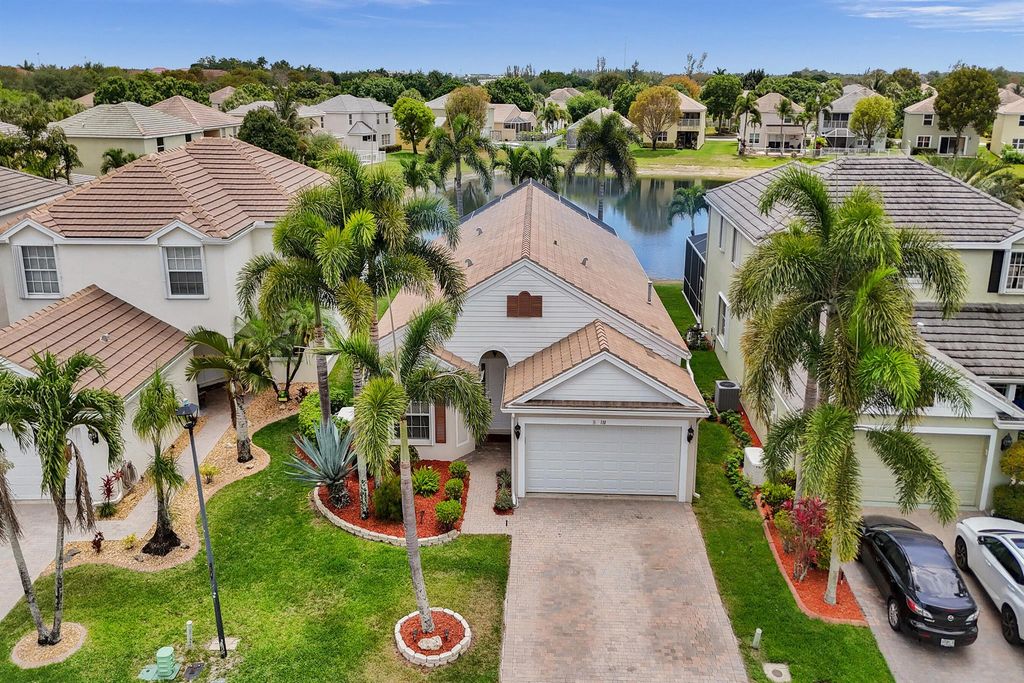 Photo of 110 Newberry Lane, Royal Palm Beach, FL 33414 (MLS # R11084308)