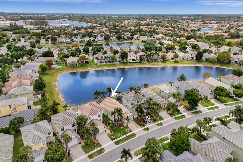 Photo of 110 Newberry Lane, Royal Palm Beach, FL 33414 (MLS # R11084308)