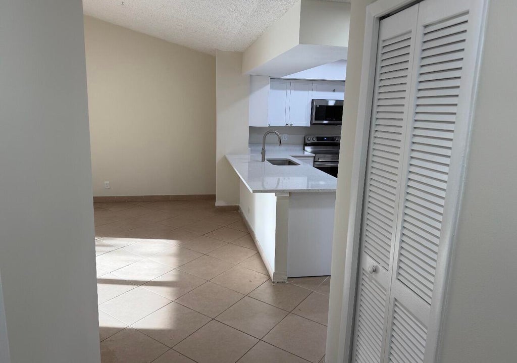 Photo of 9085 W Highland Pines Drive, Palm Beach Gardens, FL 33418 (MLS # B26031059)