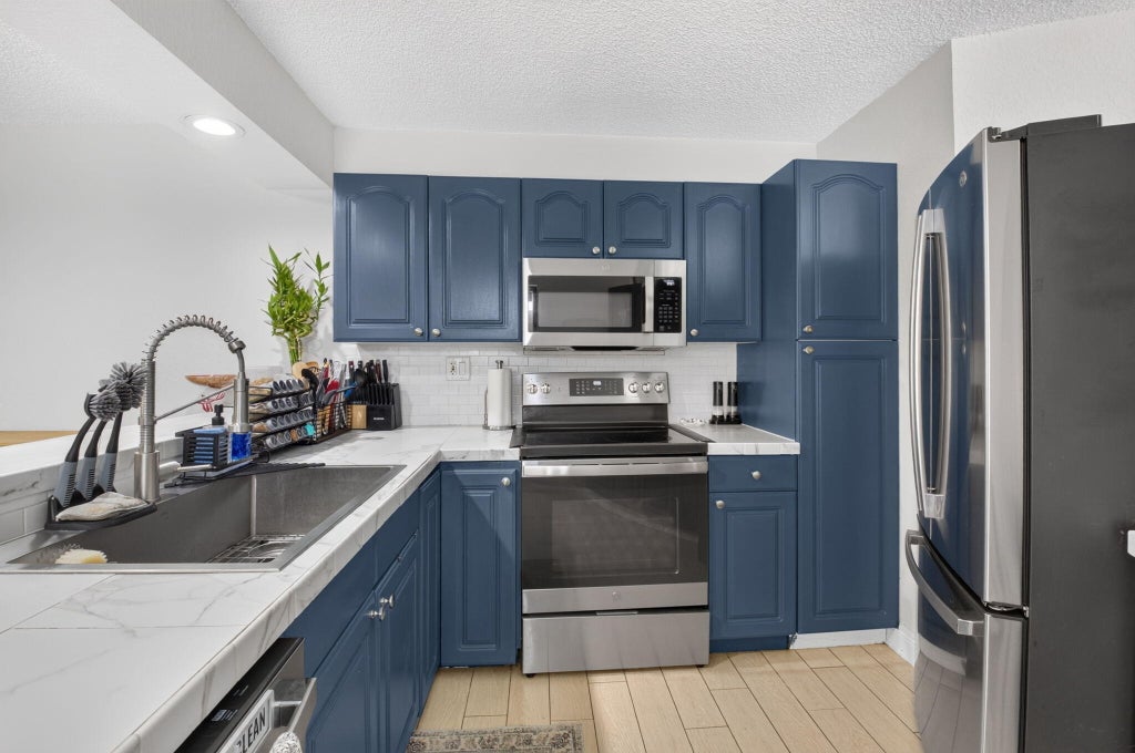 Photo of 22976 Oxford Place #C, Boca Raton, FL 33433 (MLS # B26043061)