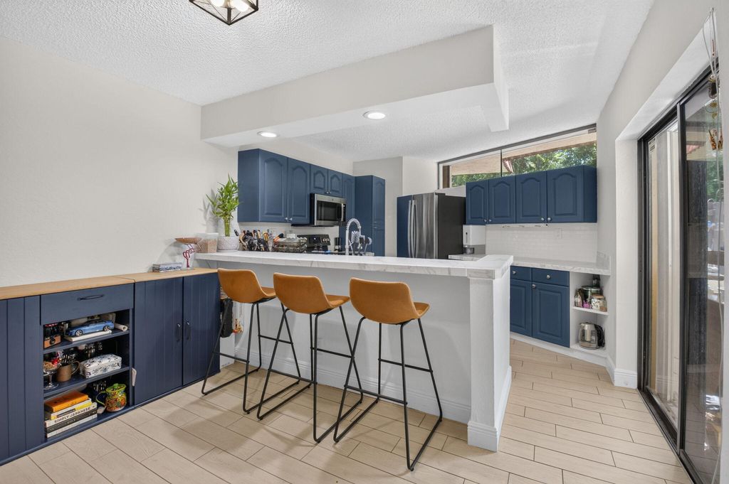 Photo of 22976 Oxford Place #C, Boca Raton, FL 33433 (MLS # B26043061)