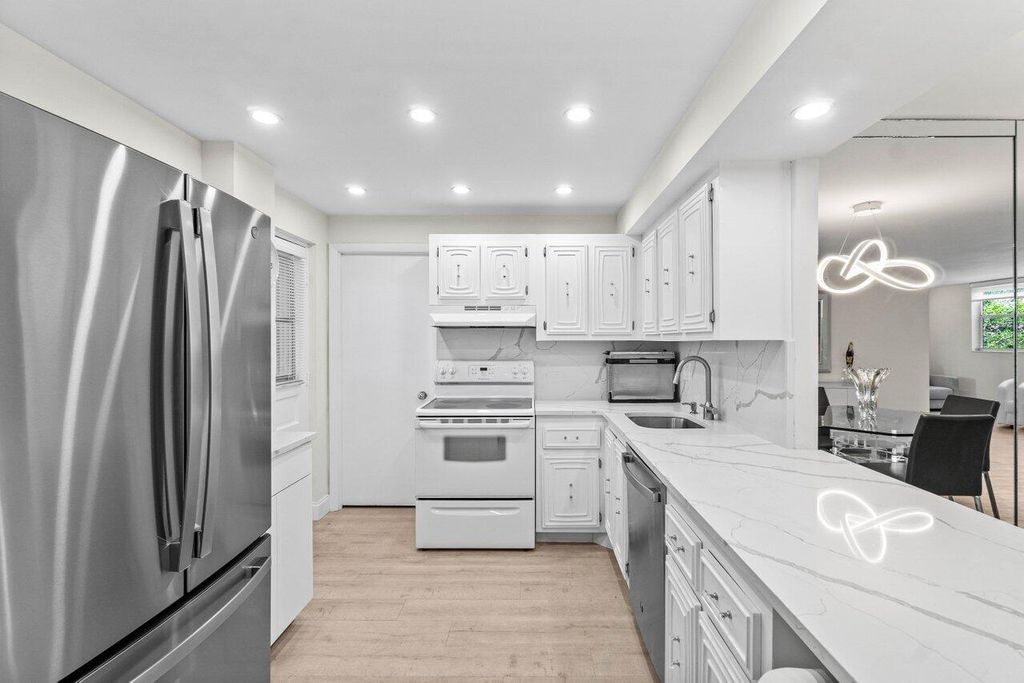 Photo of 6461 NW 2nd Avenue #411, Boca Raton, FL 33487 (MLS # B26001490)