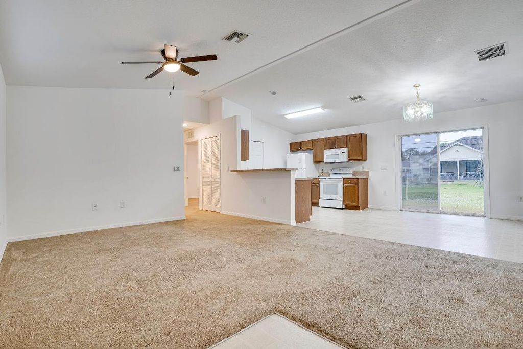 Photo of 834 SW Nichols Terrace, Port Saint Lucie, FL 34953 (MLS # R10936412)