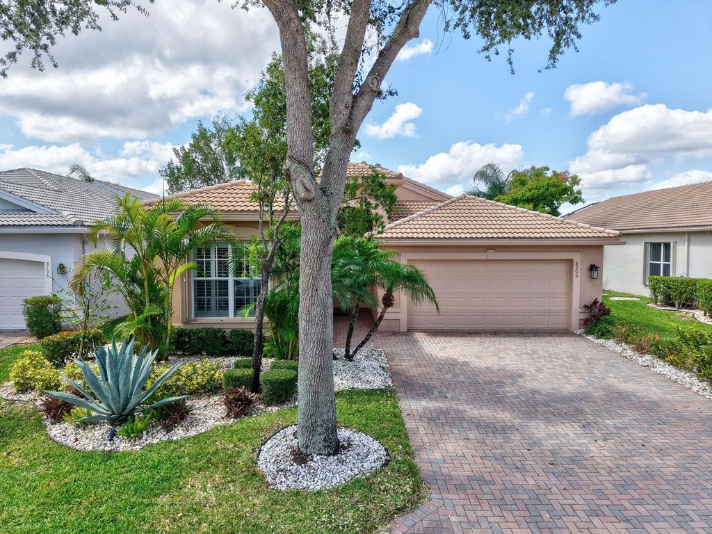 Photo of 8206 Azure Coast Boulevard, Lake Worth, FL 33467 (MLS # F10501768)