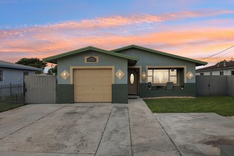 Photo of 5411 SW 19th St, West Park, FL 33023 (MLS # F10531643) Photo of 5411 SW 19th St, West Park, FL 33023 (MLS # F10531643)