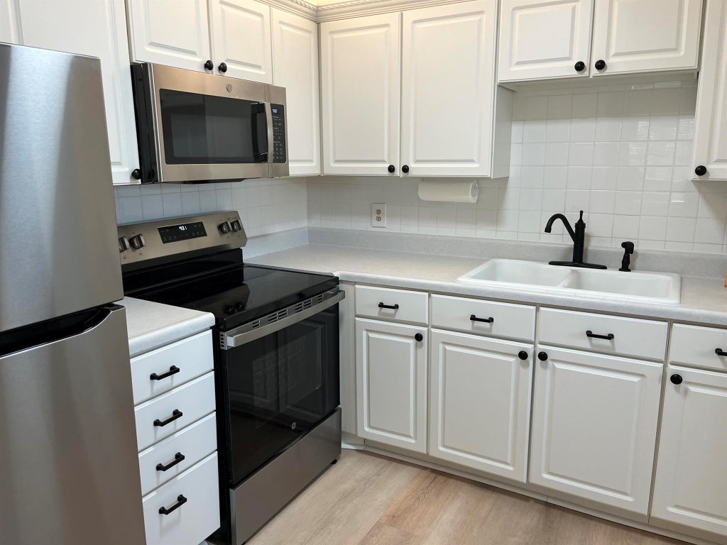 Photo of 214 Saxony E, Delray Beach, FL 33484 (MLS # R11018358)