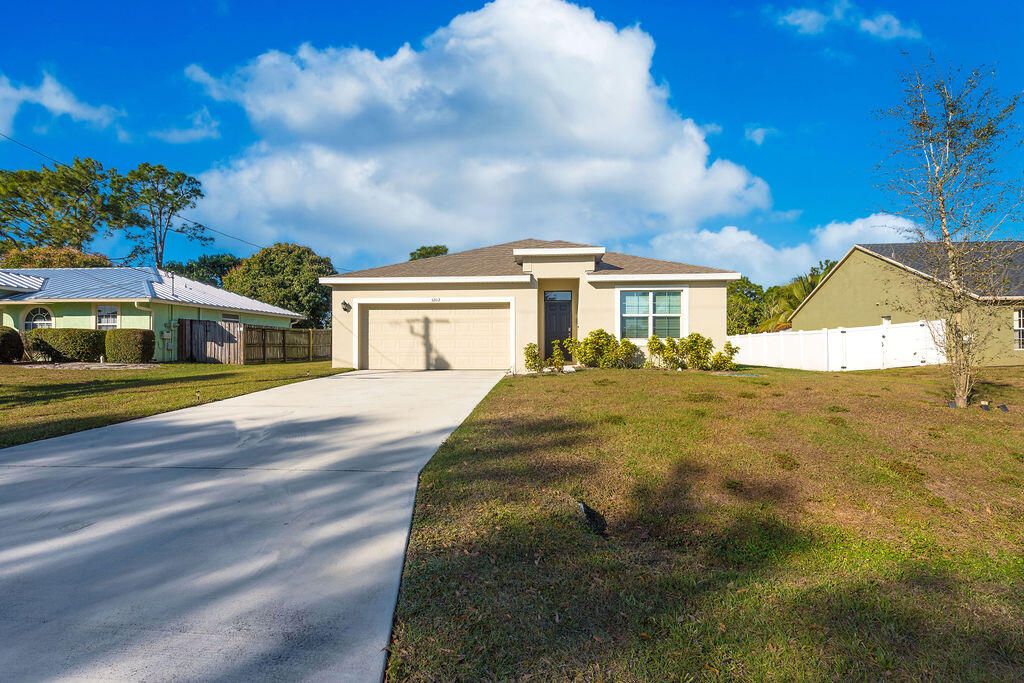 Photo of 3202 SW Martin Street, Port Saint Lucie, FL 34953 (MLS # R11159012)