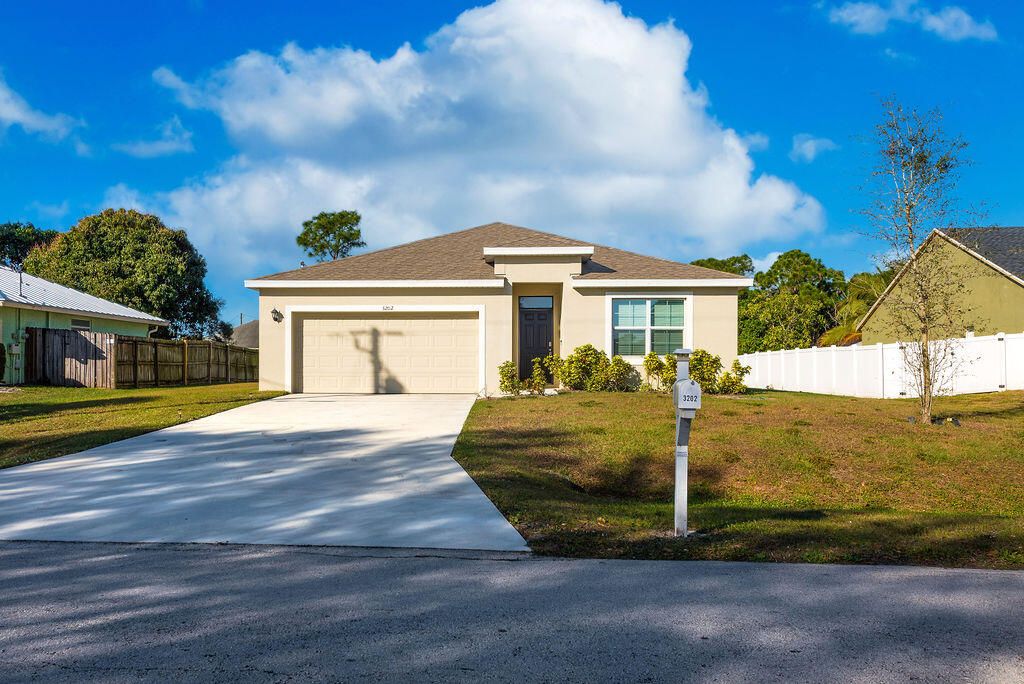 Photo of 3202 SW Martin Street, Port Saint Lucie, FL 34953 (MLS # R11159012)