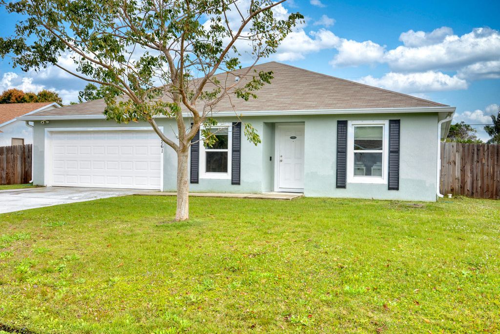 Photo of 2261 SE Gaslight Street, Port Saint Lucie, FL 34952 (MLS # R10961261)