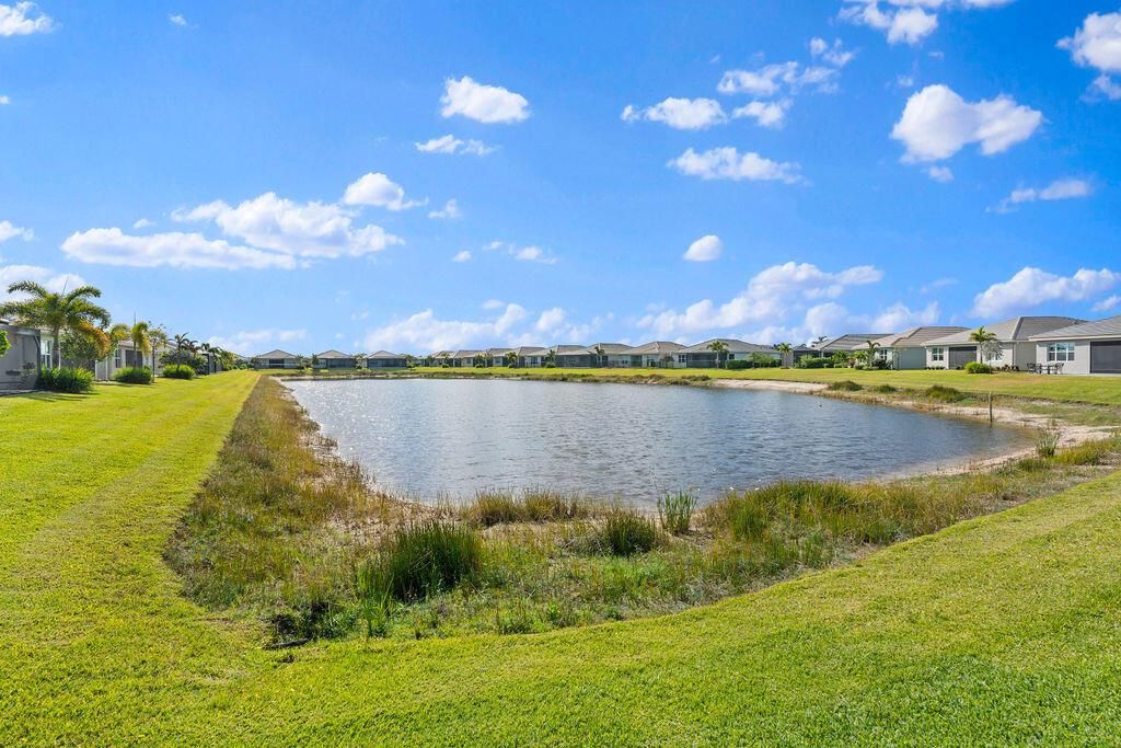 Photo of 11663 SW River Crossing Place, Port Saint Lucie, FL 34987 (MLS # R10984561)