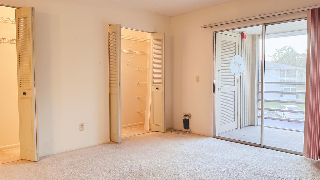 Photo of 25 Lake Vista Trail #204, Port Saint Lucie, FL 34952 (MLS # B26004354)