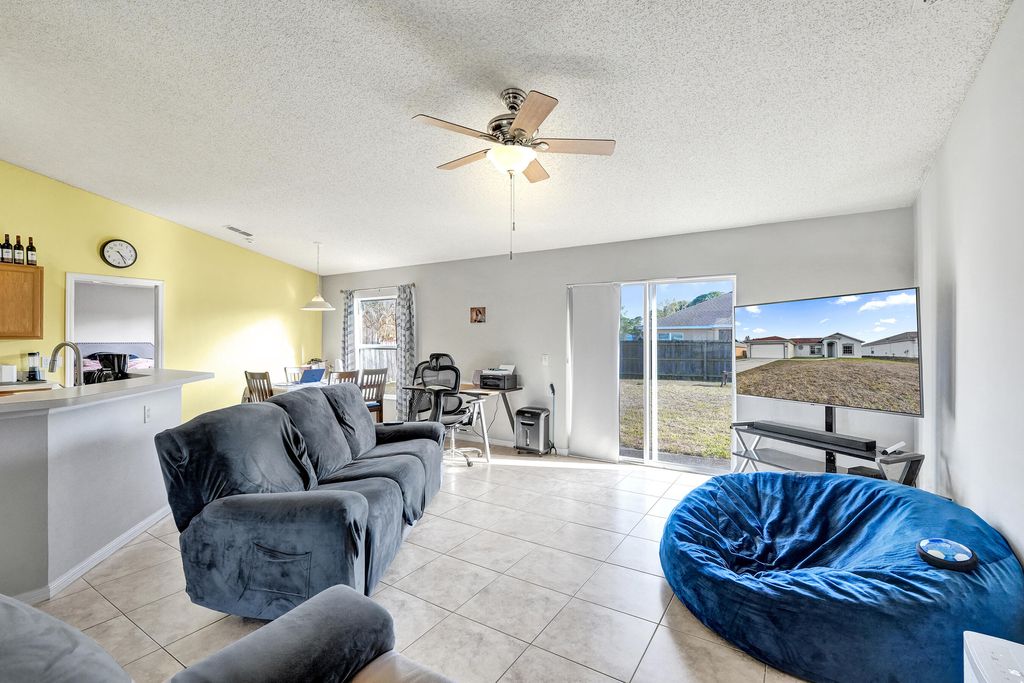 Photo of 1020 SW Barbarosa Avenue, Port Saint Lucie, FL 34953 (MLS # R11168670)