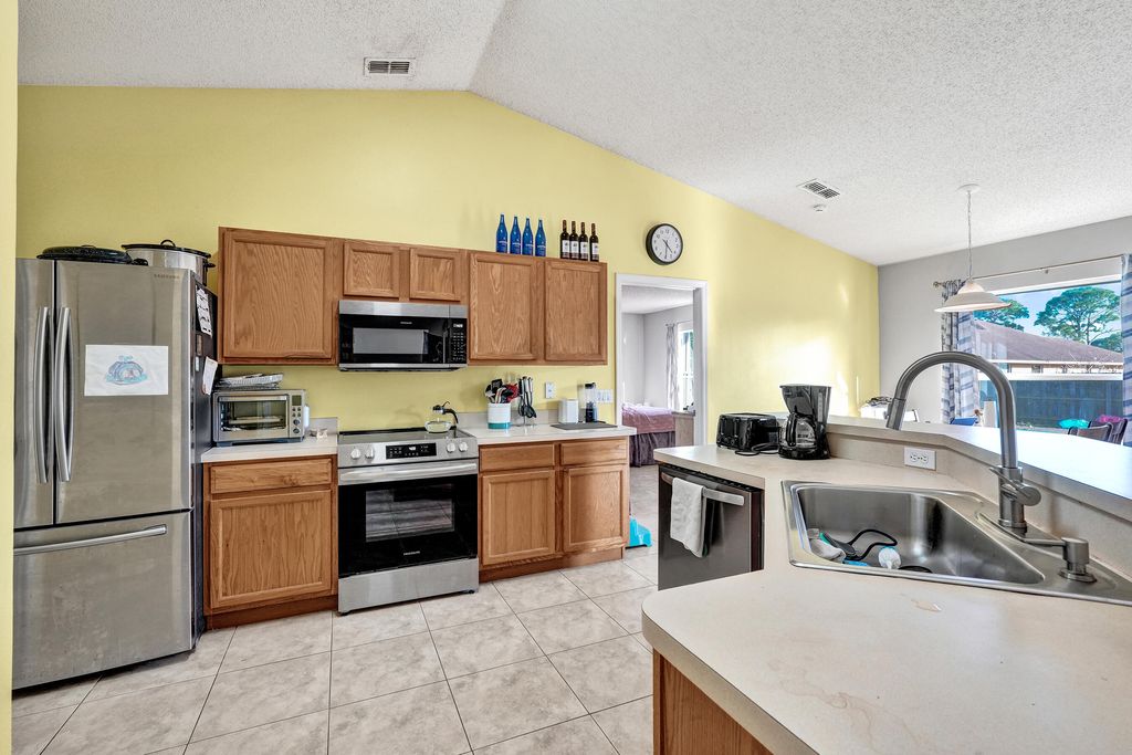 Photo of 1020 SW Barbarosa Avenue, Port Saint Lucie, FL 34953 (MLS # R11168670)