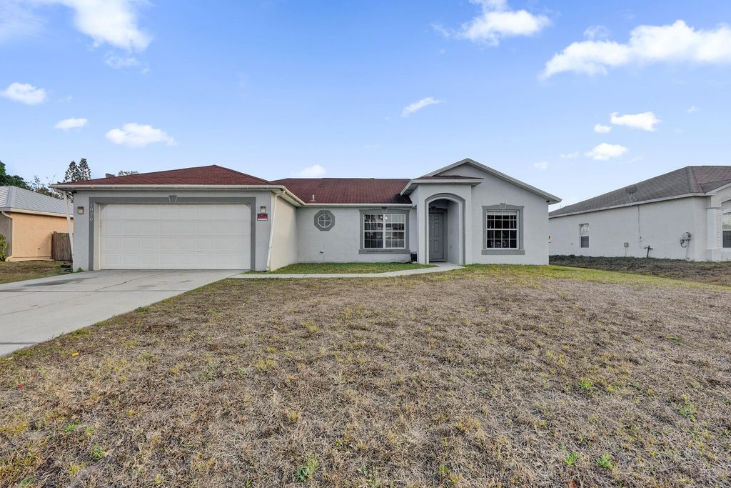 Photo of 1020 SW Barbarosa Avenue, Port Saint Lucie, FL 34953 (MLS # R11168670)