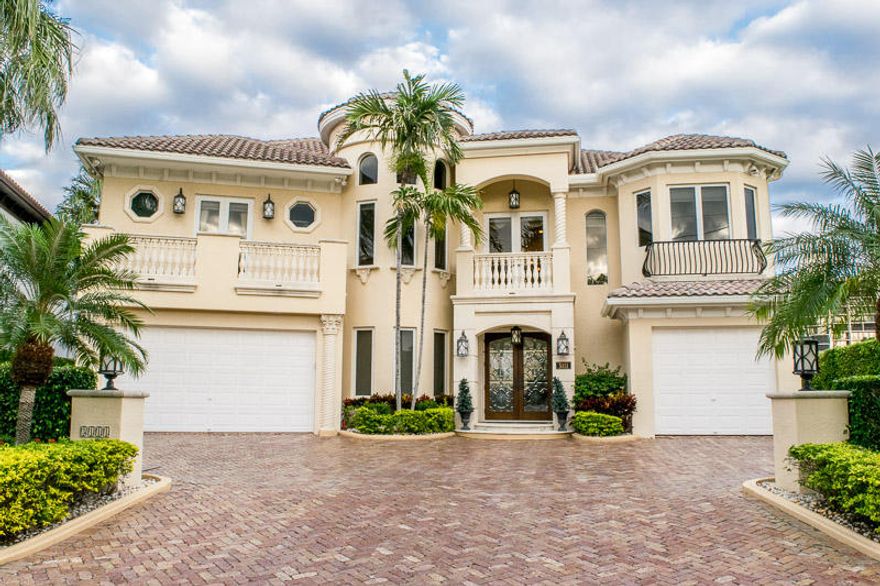 Magnificent one of a kind Custom smart home, on a rare sought after 110' direct intercostal lot.  This home boast over 5000 sq. ft., featuring 5 bedrooms, 5 full bathrooms, loft, a cabana bathroom and a powder room. Incredible view of the intercostal over your infinity edge pool, with spa and custom fountain.  The main floor features an incredible Great room with a custom stone fireplace, and windows all the way up to the 19 foot ceilings, giving the most incredible views of the intercostal.  A large Chefs kitchen overlooks the living room, breakfast area and separate bar.  Take the elevator to the second floor and meet your giant master suite featuring a fire place, incredible views, wet bar, large balcony on the intercostal, an enormous closet and a custom his and her bath.