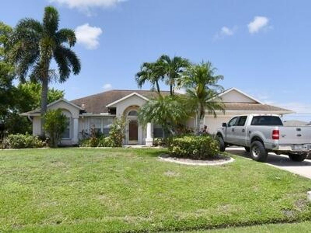 Photo of 5505 NW Evanston Avenue, Port Saint Lucie, FL 34983 (MLS # R11157873)