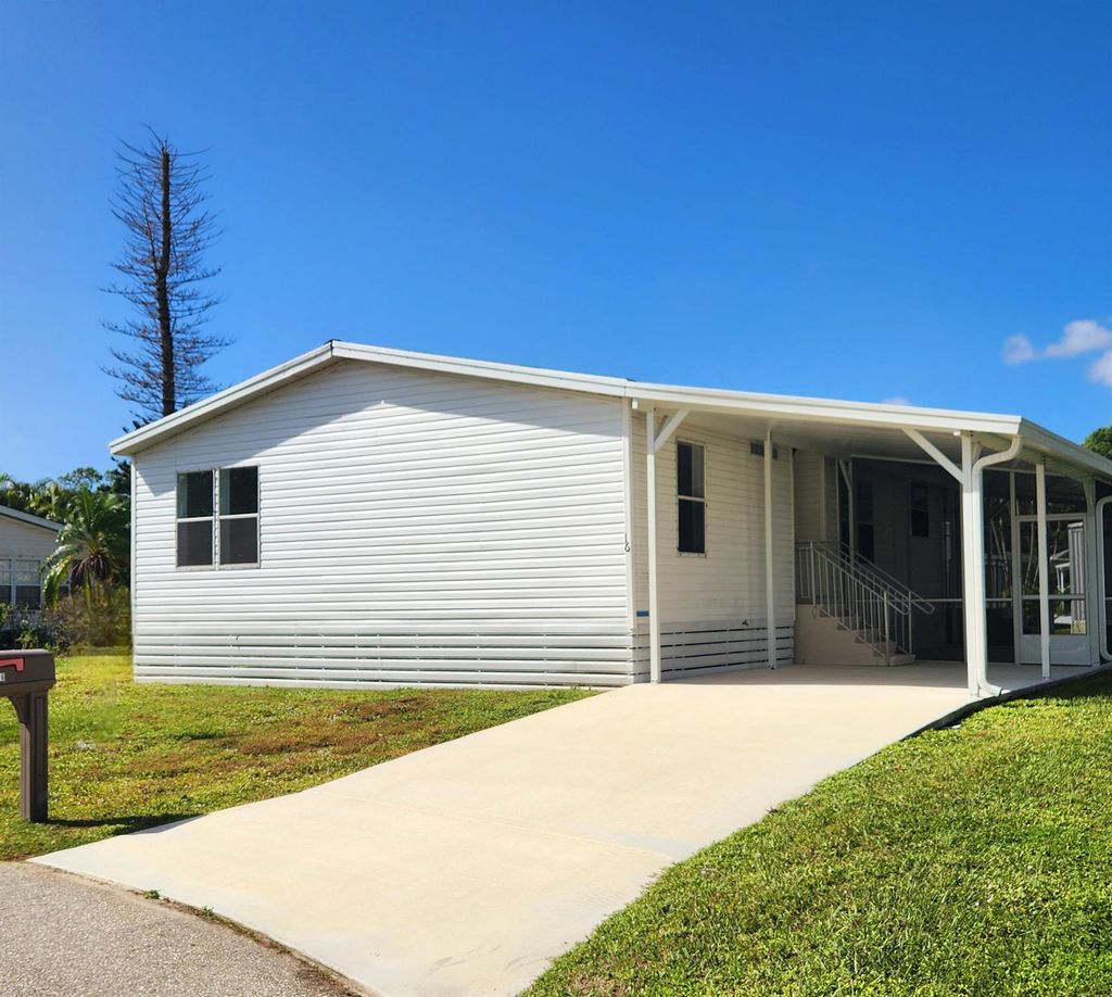 Photo of 16 Nuevo Leon Road, Port Saint Lucie, FL 34952 (MLS # R11032840)