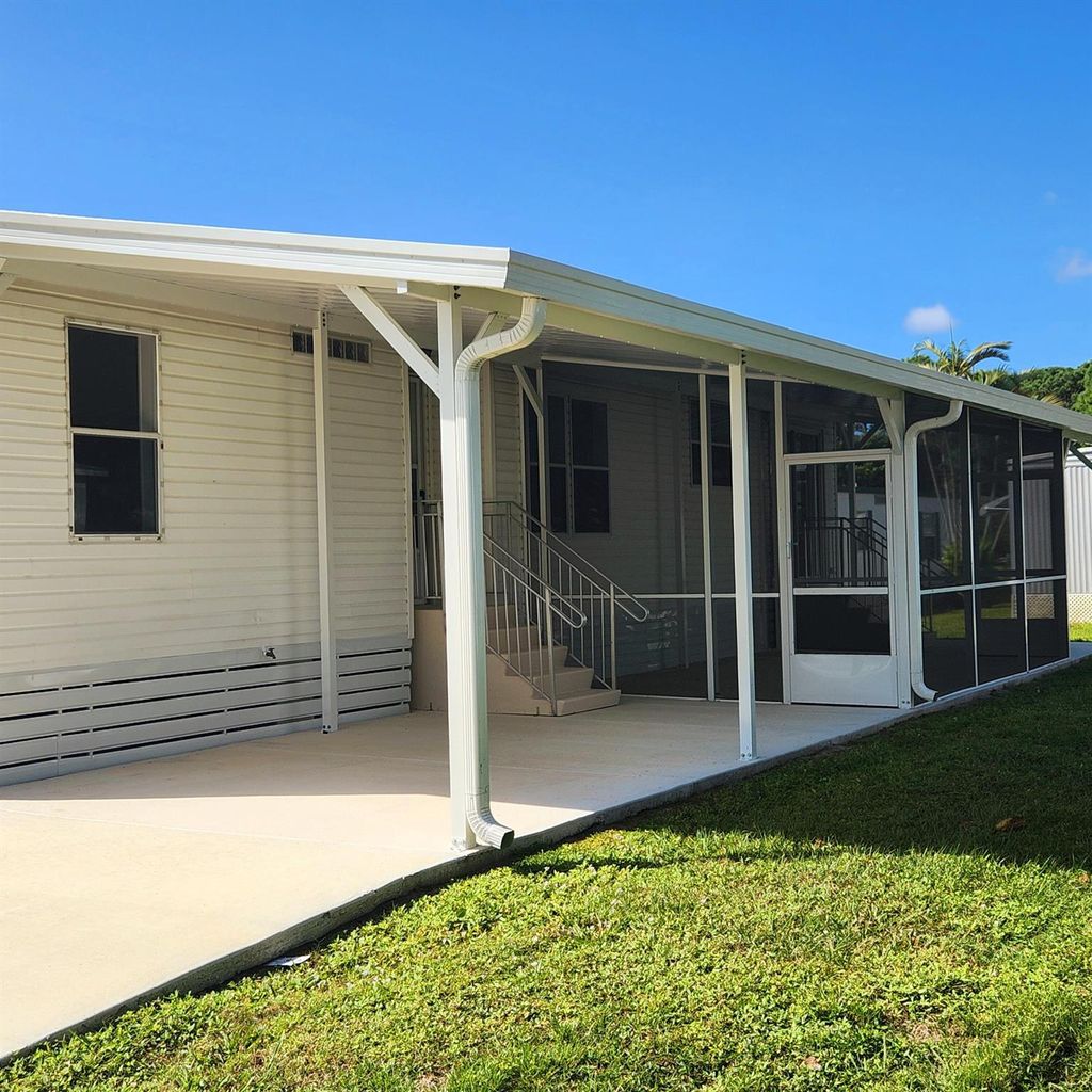 Photo of 16 Nuevo Leon Road, Port Saint Lucie, FL 34952 (MLS # R11032840)