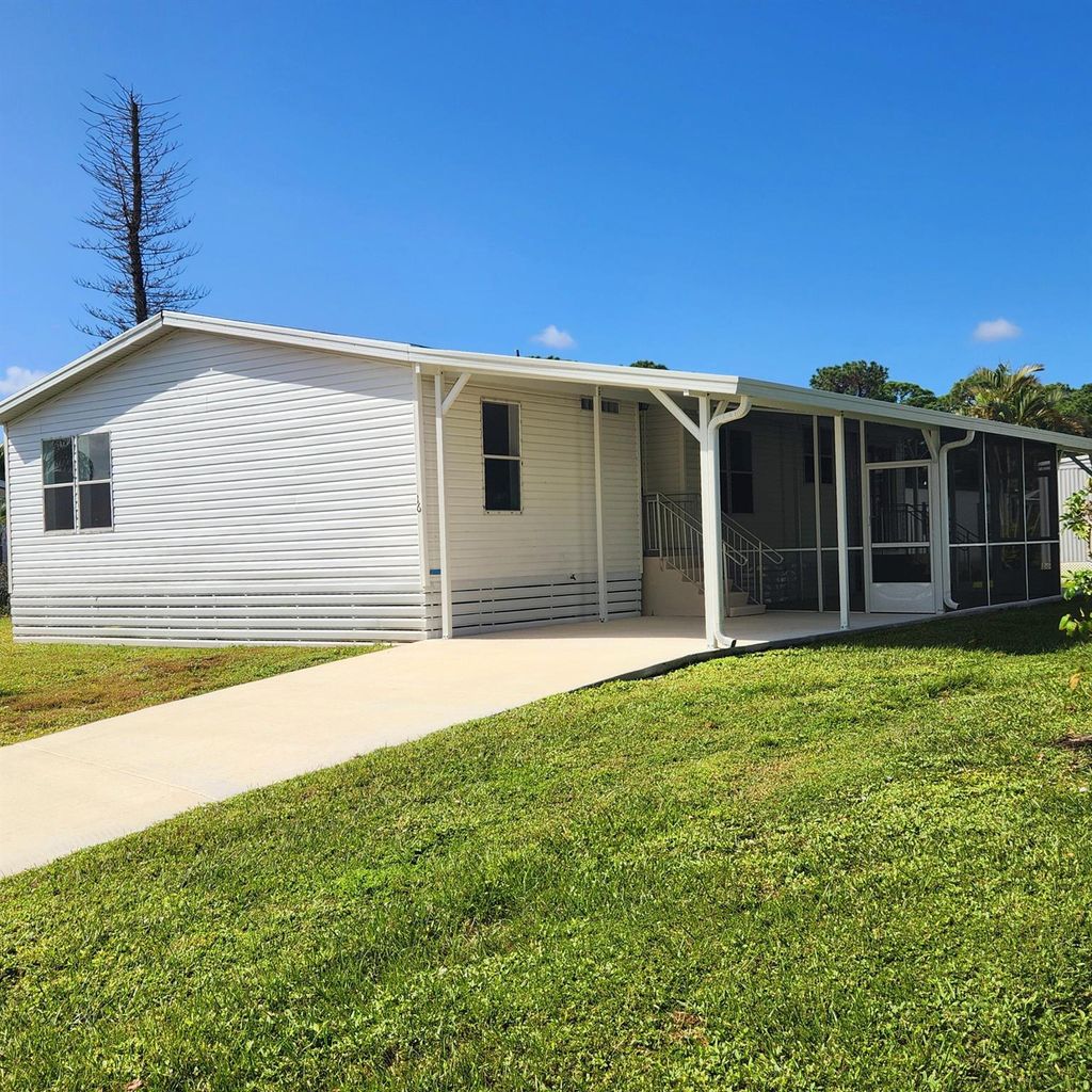 Photo of 16 Nuevo Leon Road, Port Saint Lucie, FL 34952 (MLS # R11032840)